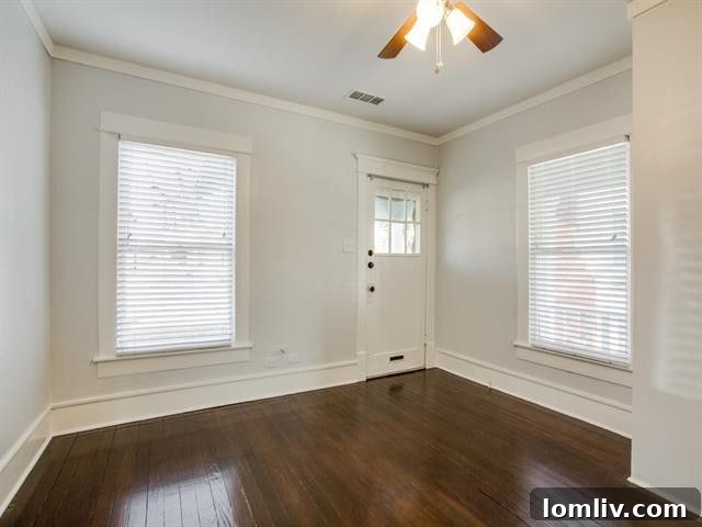 Interior view of the newly renovated kitchen with modern appliances and light fixtures.