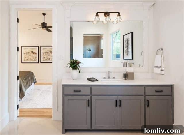 Elegant master bathroom with dual vanity and stylish finishes