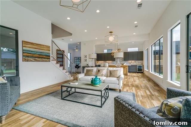 Dining area adjacent to the contemporary kitchen, ready for guests