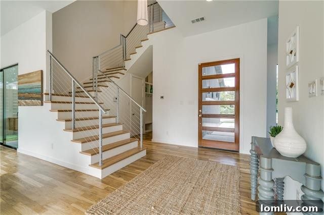 Modern cable staircase leading to the luxurious master suite