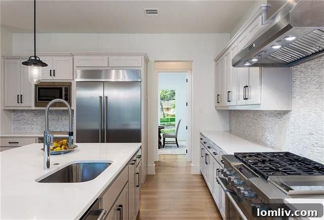 High-end stainless steel appliances and custom cabinetry in Dallas kitchen