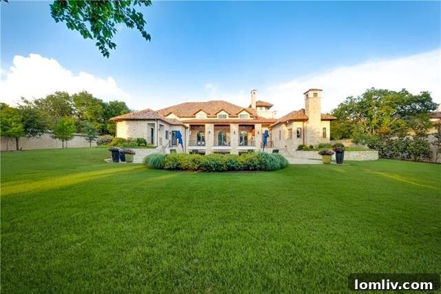 Serene view of the water feature and landscaped courtyard, evoking an Italian villa