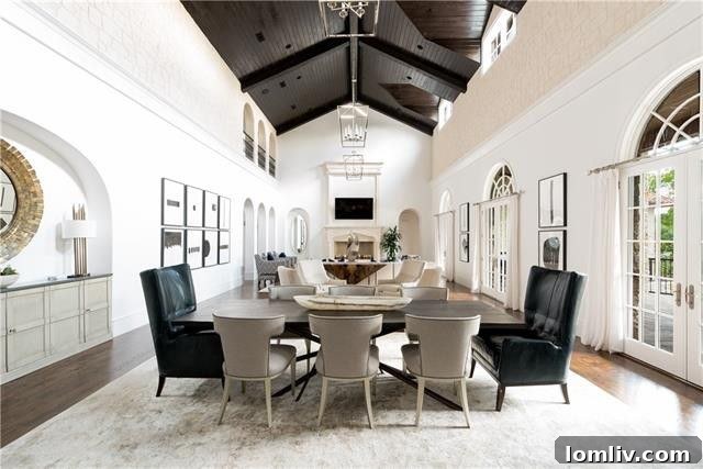 Spacious gourmet kitchen with white Macabus quartzite backsplash and island