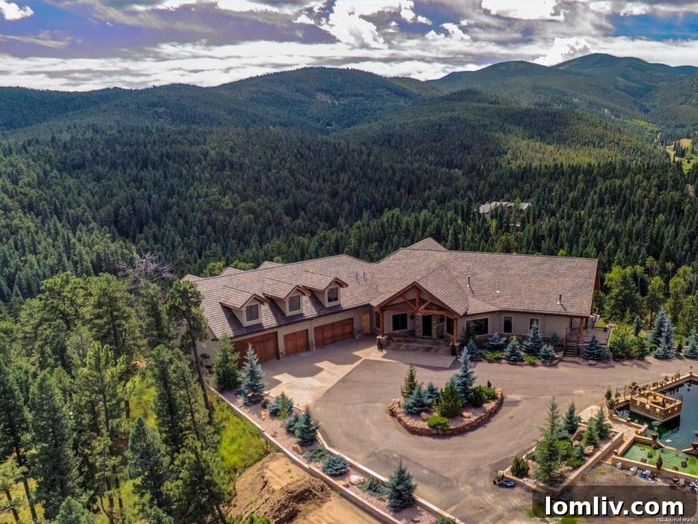Majestic exterior view of the luxury mountain home at 577 Bear Meadow Trail, Evergreen Colorado