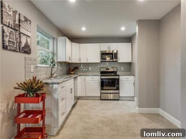 Modern kitchen with granite counters and stainless steel appliances