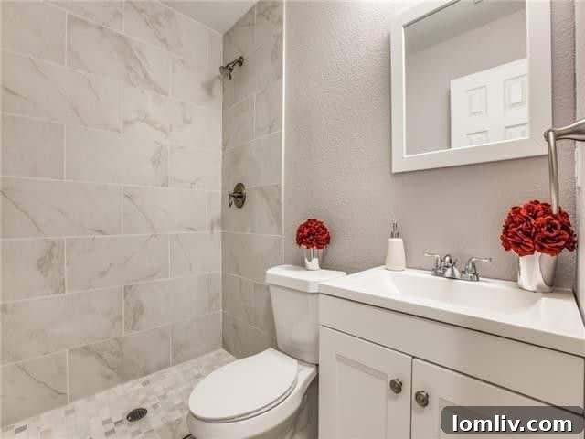 Updated bathroom with modern shower enclosure