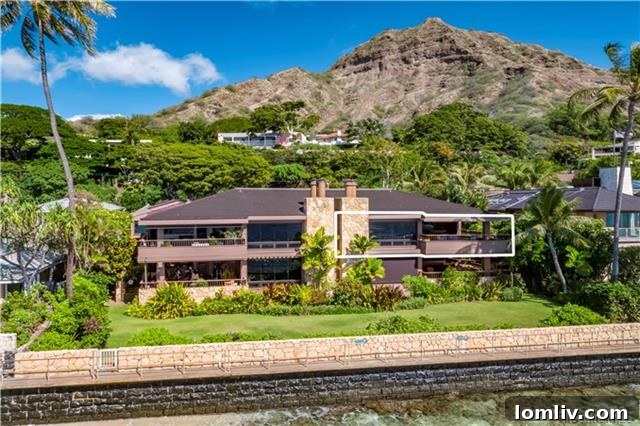 Exterior view of Ku'u Makana, an exclusive four-unit oceanfront community at the foot of Diamond Head, Honolulu, with one unit highlighted.