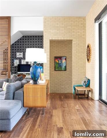 Modern dining area with elegant lighting and direct access to the kitchen