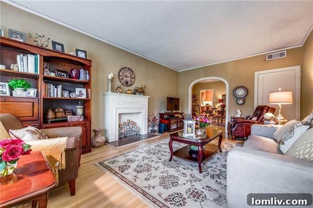 Interior of renovated duplex unit showcasing hardwood floors and modern finishes