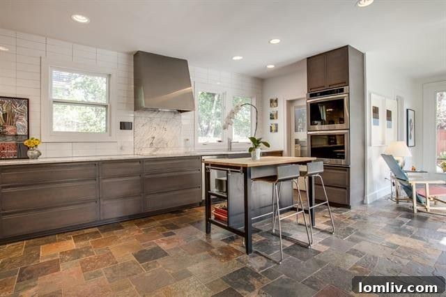 Modern, sleek custom kitchen with ample space and views to the backyard at 1214 N. Clinton Ave