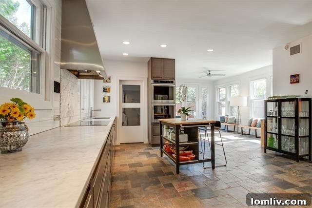 Inviting swimming pool and outdoor entertaining space in the backyard of 1214 N. Clinton Ave