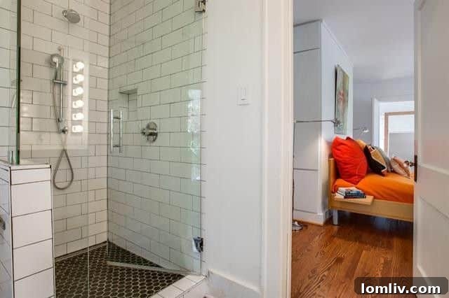 Tastefully modernized bathroom with elegant fixtures, blending contemporary and classic styles at 1214 N. Clinton Ave