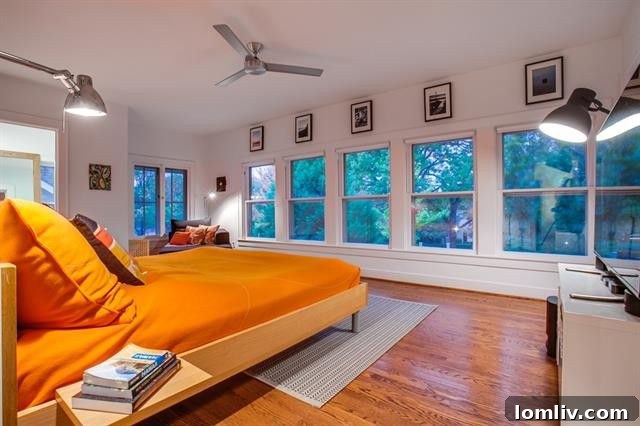 Spacious and bright bedroom featuring large windows and ample natural light at 1214 N. Clinton Ave