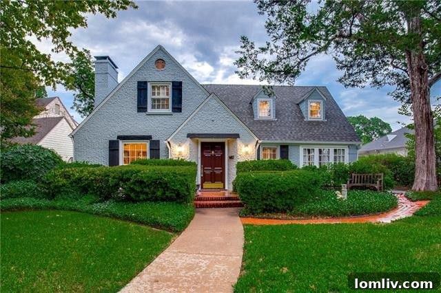 Exterior of a classic 1936 traditional home at 1228 Lausanne Ave with a well-maintained lawn
