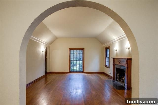 Elegant dining area featuring classic molding and natural light at 1228 Lausanne Ave