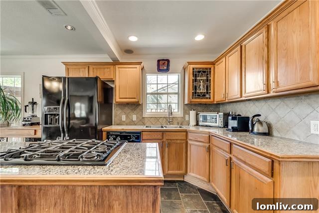 Open concept kitchen with island and dining area