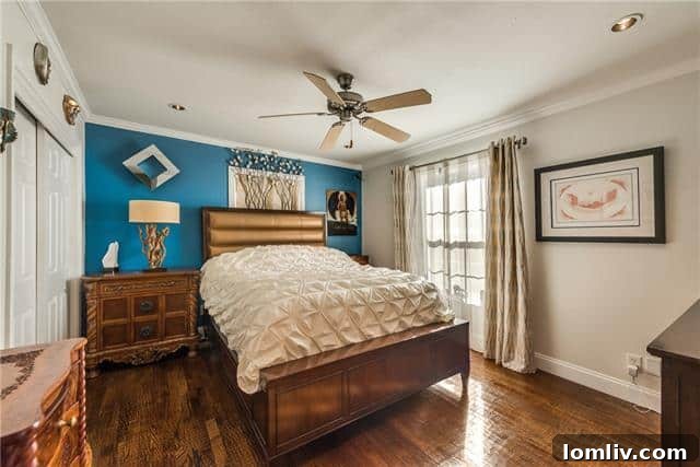 Master bedroom with elegant decor and natural light