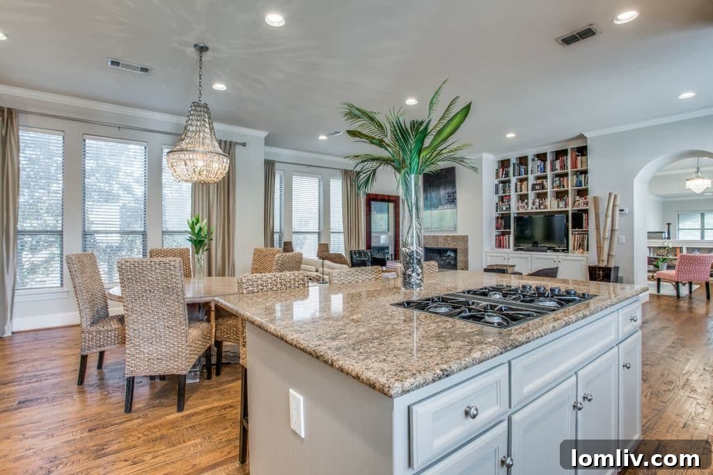 Kitchen island with seating and modern light fixtures