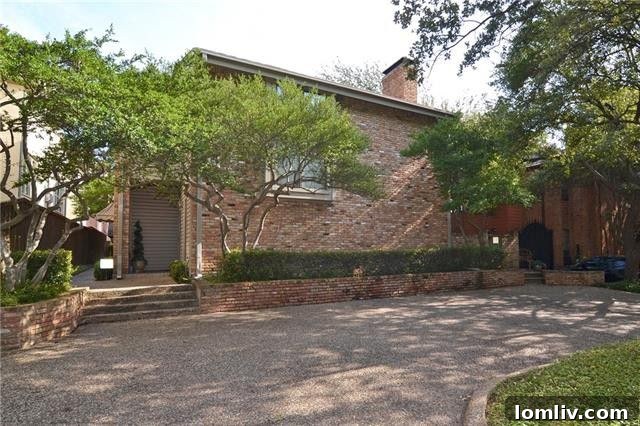 Lush greenery surrounding a private outdoor patio space