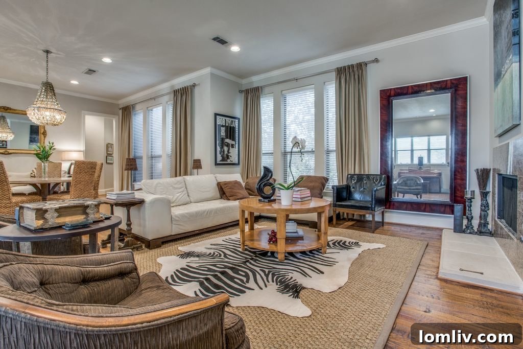 Elegant family room with a fireplace and large windows