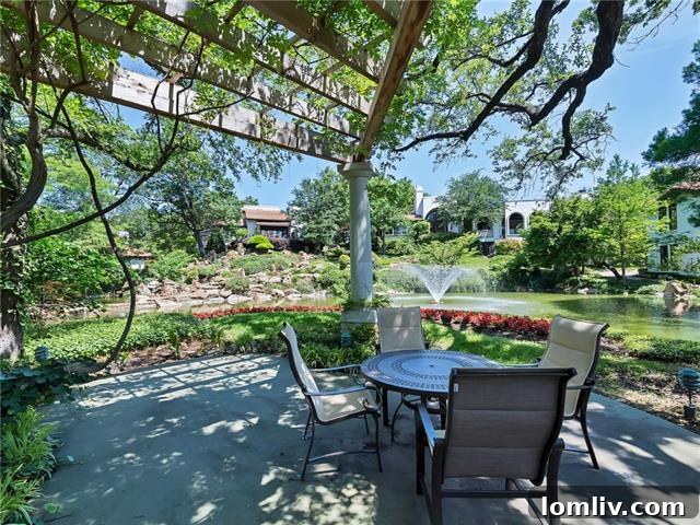 Stunning outdoor living area with golf course views and private pond