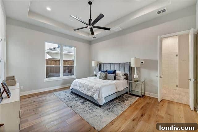 Luxurious master bathroom with modern fixtures, walk-in shower, and spacious design in Magnolia West