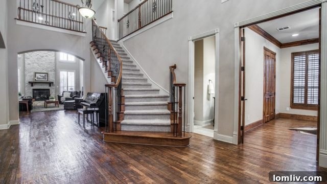 Allen Home: Your Castle Made Real 3 Elegant Living Room with Two-Story Stone Fireplace