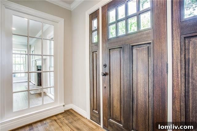 Welcoming entryway with elegant red oak floors
