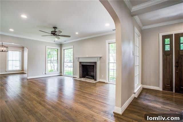 Spacious living room with a grand fireplace