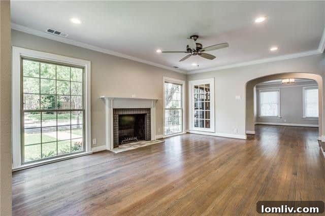 Open concept living space flowing into dining area