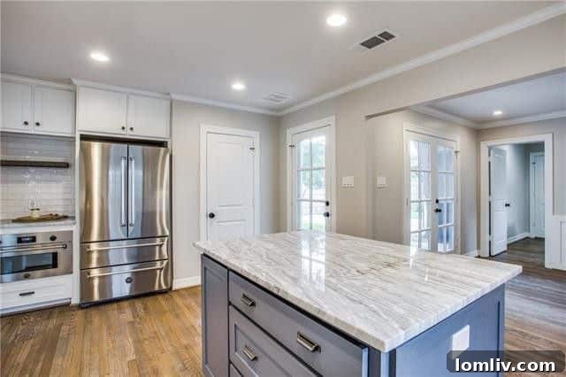 Stunning marble kitchen with high-end appliances