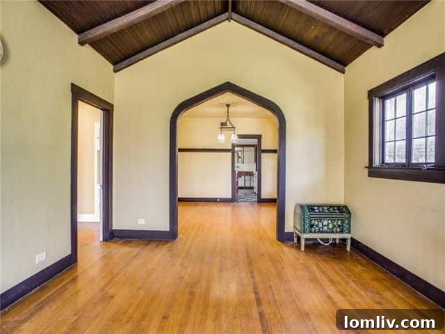 Living Room with Stone Fireplace - 6919 Mistletoe Dr.