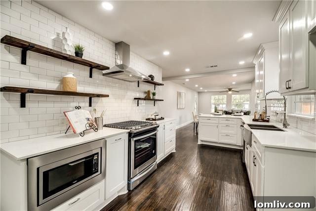 Luxurious master bedroom with sliding barn door leading to ensuite bathroom