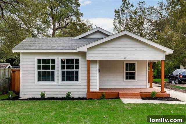 Private backyard with new board-on-board fence and lush greenery
