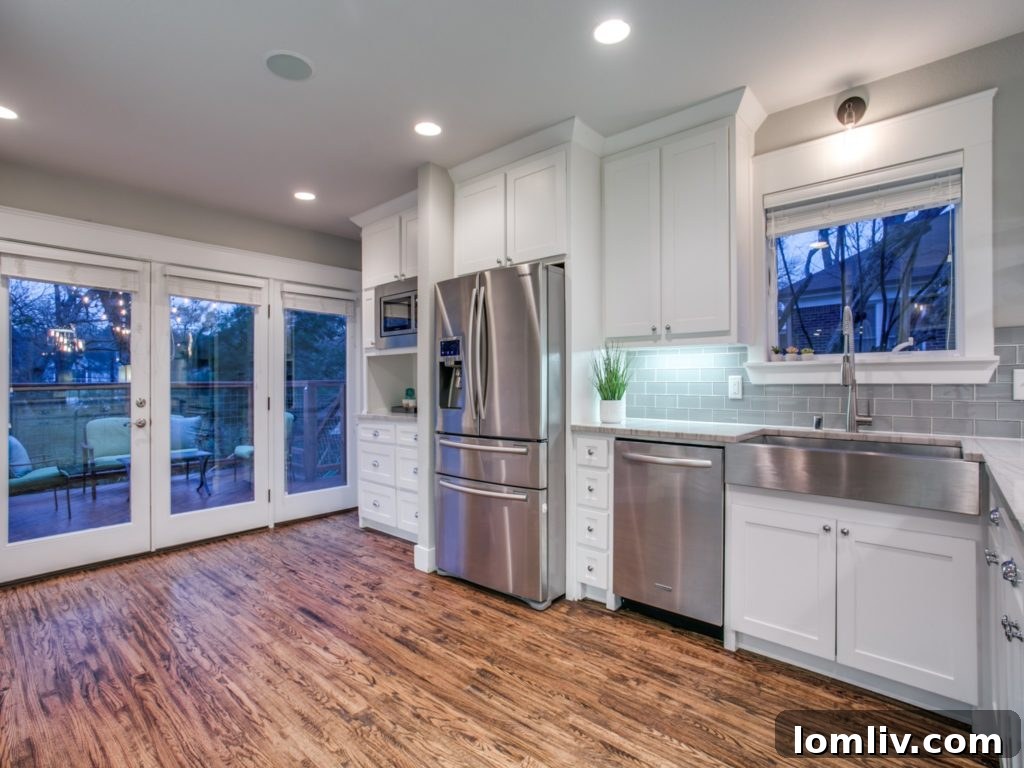 Hollywood Heights Tudor: A Captivating Canvas for Family Celebrations 9 919 Valencia Street Dallas TX - Kitchen with Ample Storage and Natural Light