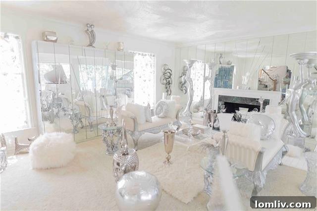 The striking all-white room within the eclectic Lion Gate Estate, offering a serene contrast