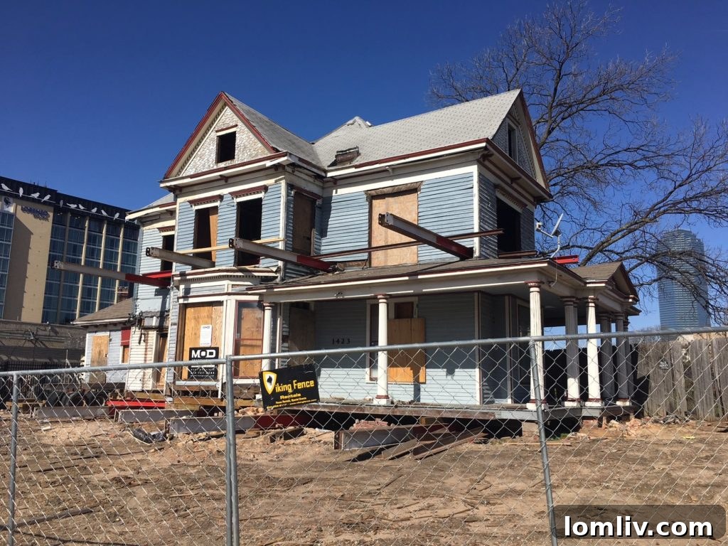 The Blue House in Dallas, Texas, undergoing meticulous restoration after its historic move