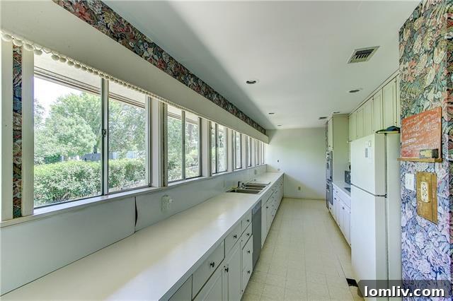 Midcentury Modern Icon on the Waterfront 8 Lower Level Living Area with Polished Concrete Floors