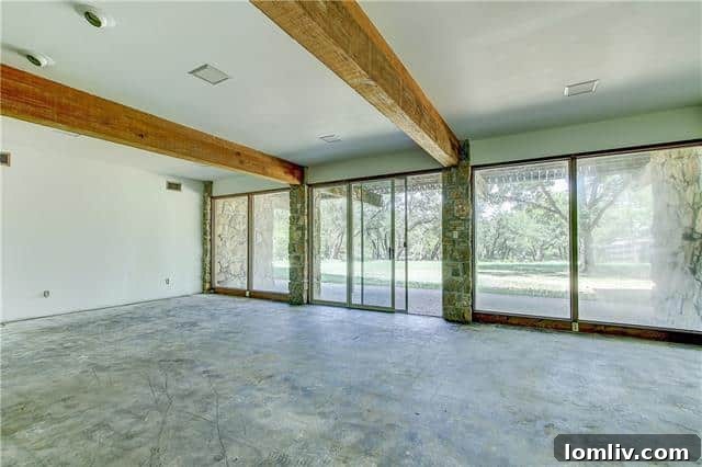 Midcentury Modern Icon on the Waterfront 9 Lower Level Fireplace and Lake Access