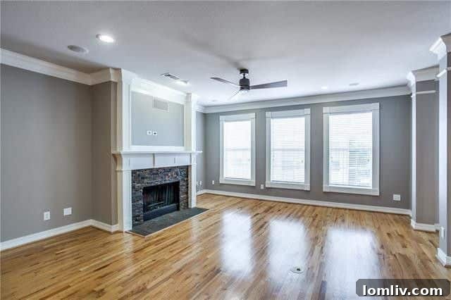 Spacious open-concept living room on the main floor of the Uptown Dallas townhome, perfect for entertaining.