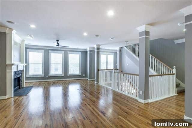 Close-up of the stylish kitchen island and modern light fixtures.