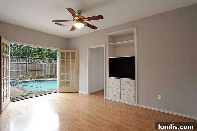 Updated kitchen with tin ceiling and glass cabinets in Tudor house
