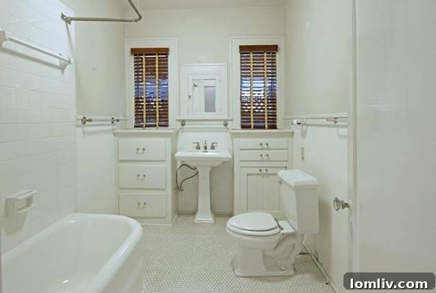 Elegant master bedroom with French doors to private deck