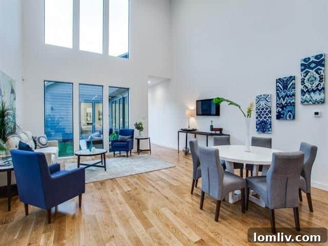 Your Turnkey Home Awaits in New Maple District for $555K 3 Exterior view of a newly built modern duplex in Dallas's Maple District