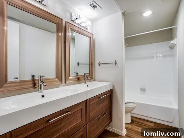 Bathroom with double sinks and contemporary finishes