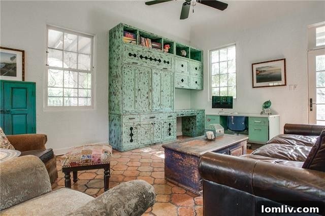 A vibrant and inviting bedroom, showcasing a blend of comfort and the home's unique character, with ample natural light.
