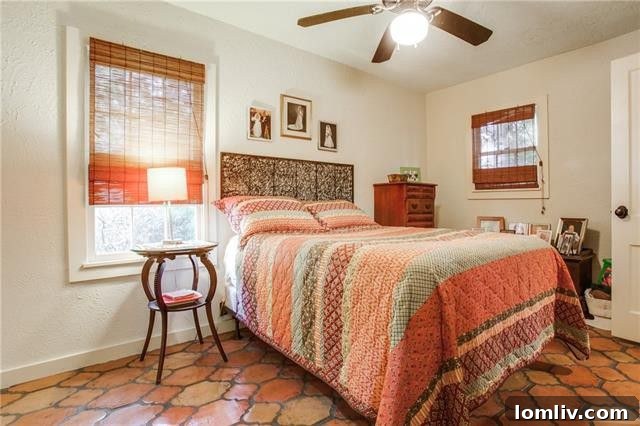 A view of the lush backyard or a garden area, emphasizing the half-acre plot and the outdoor living potential of the property.