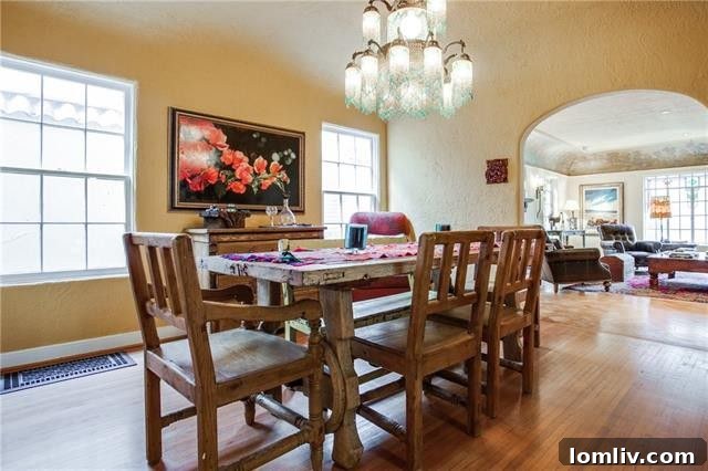 A view of the beautifully landscaped front yard or a section of the facade, emphasizing the home's curb appeal and classic design.