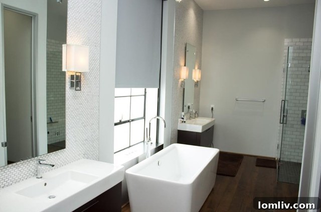 Modern and Crisp Second Bathroom Featuring a Large Window and Walk-in Shower at 2292 Vantage