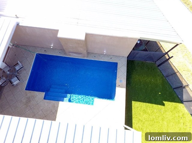 Private Backyard Oasis with a Swimming Pool and Poolside Fireplace at 2292 Vantage Street